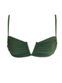 Green bikini top on a white background