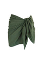 Green wrap-style top on a white background