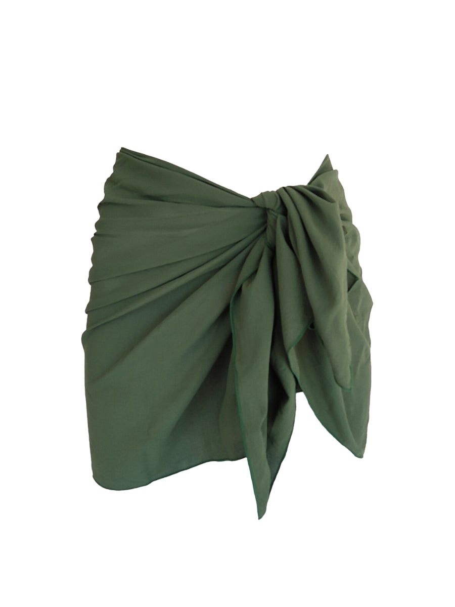 Green wrap-style top on a white background